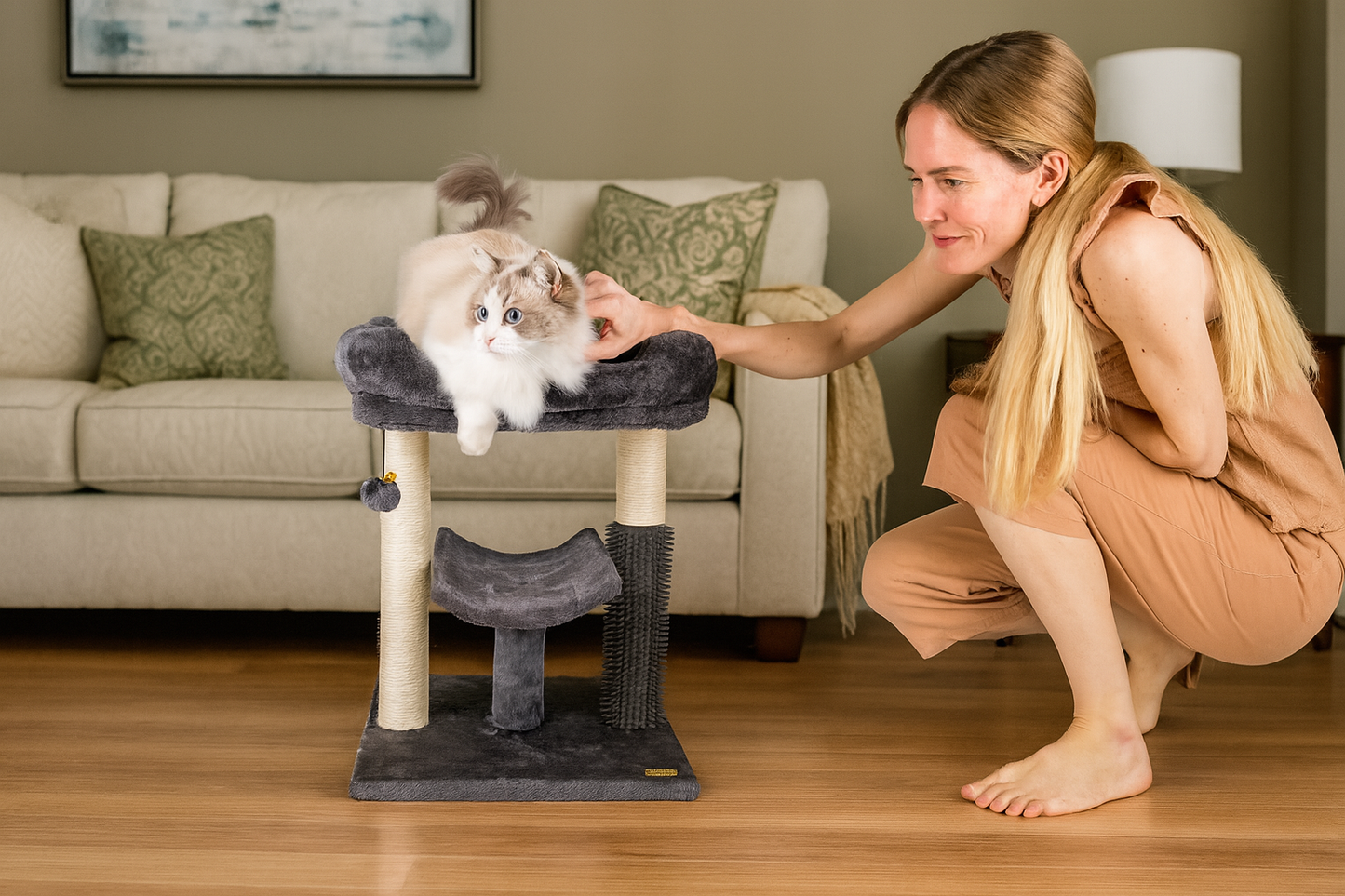 woman patting cat on cat tree